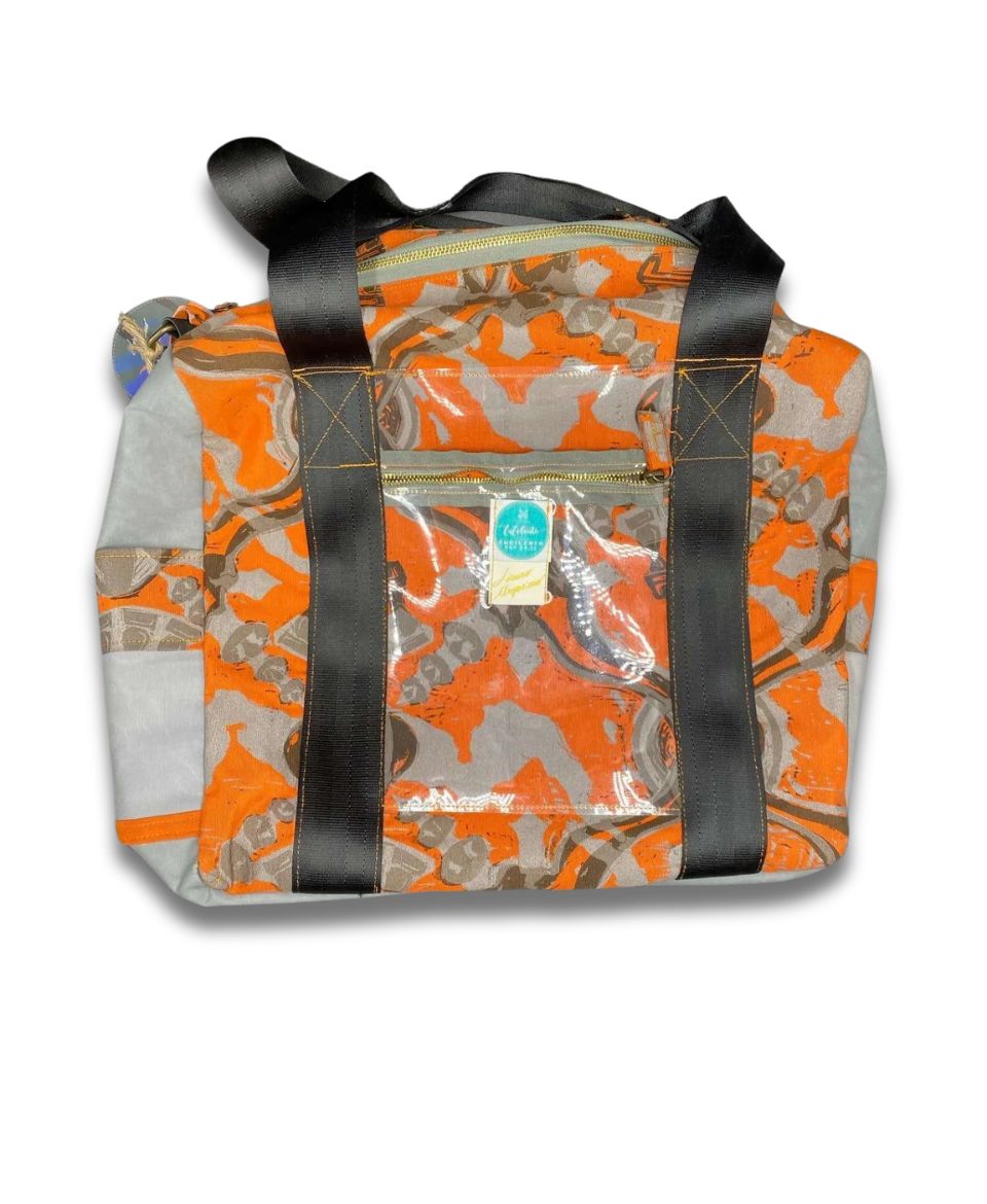 Annaré – Borsa da viaggio arancione x CuCilento limited edition Lorenzo Argenziano tessuti a stamoa